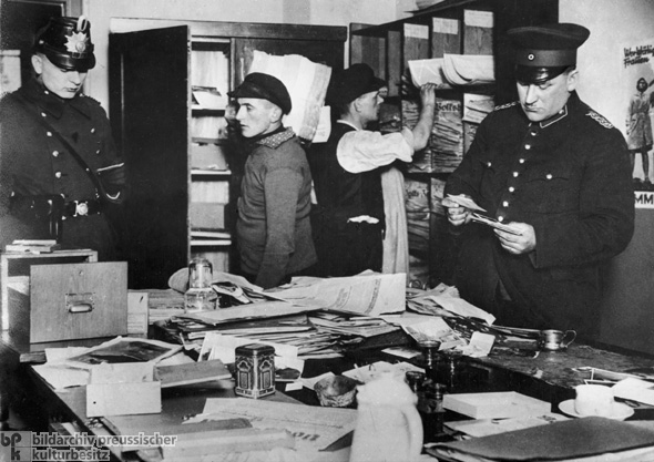 Members of the Gestapo and the Security Police [<i>Schutzpolizei</i>] Occupy and Search the Berlin Headquarters of the German Communist Party (February 23, 1933)